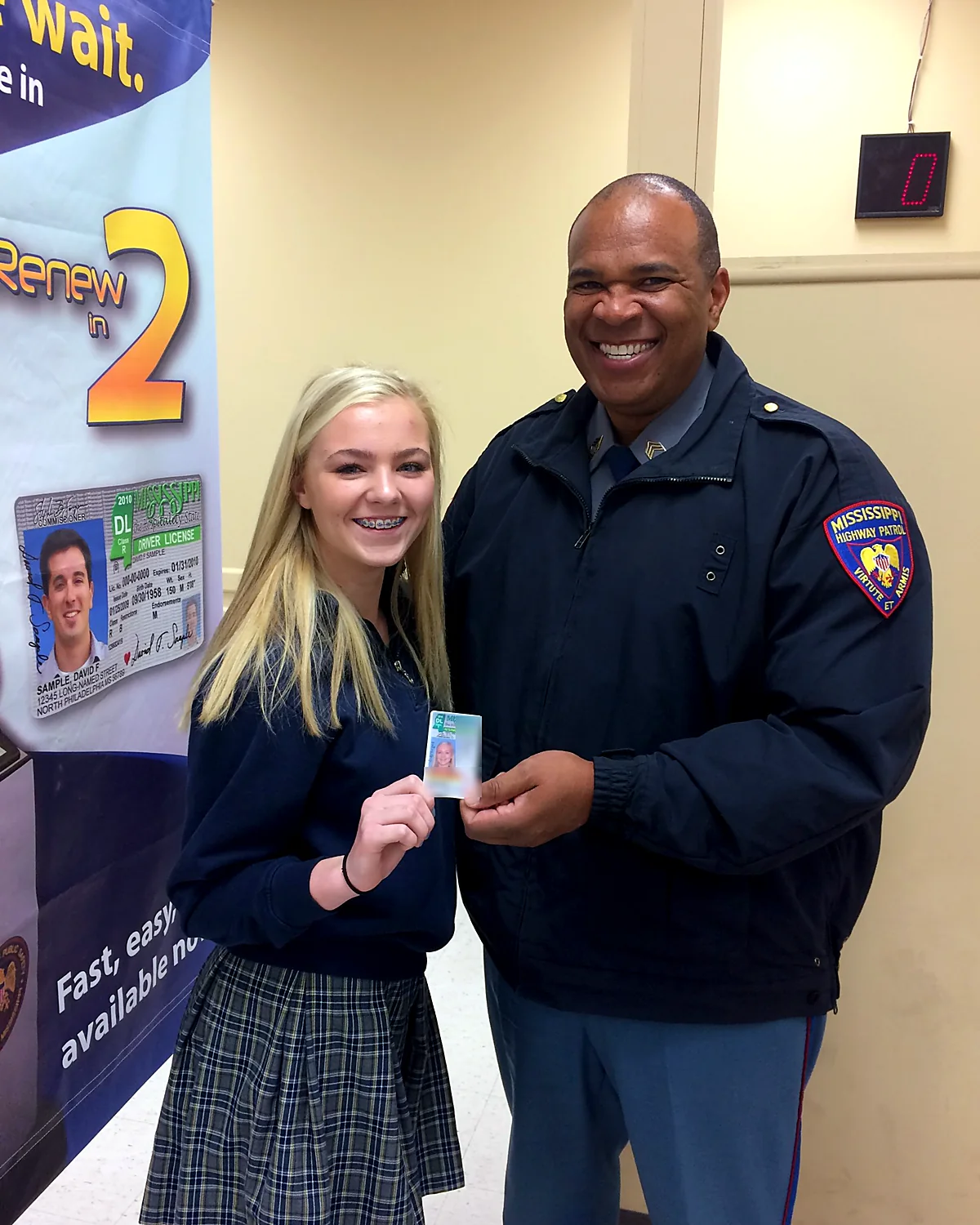 Magnolia State student holding her new Mississippi driver's license