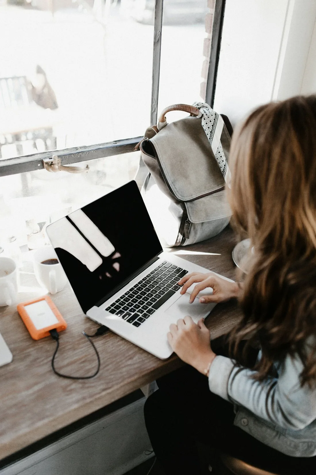 A student working through the online course on a laptop